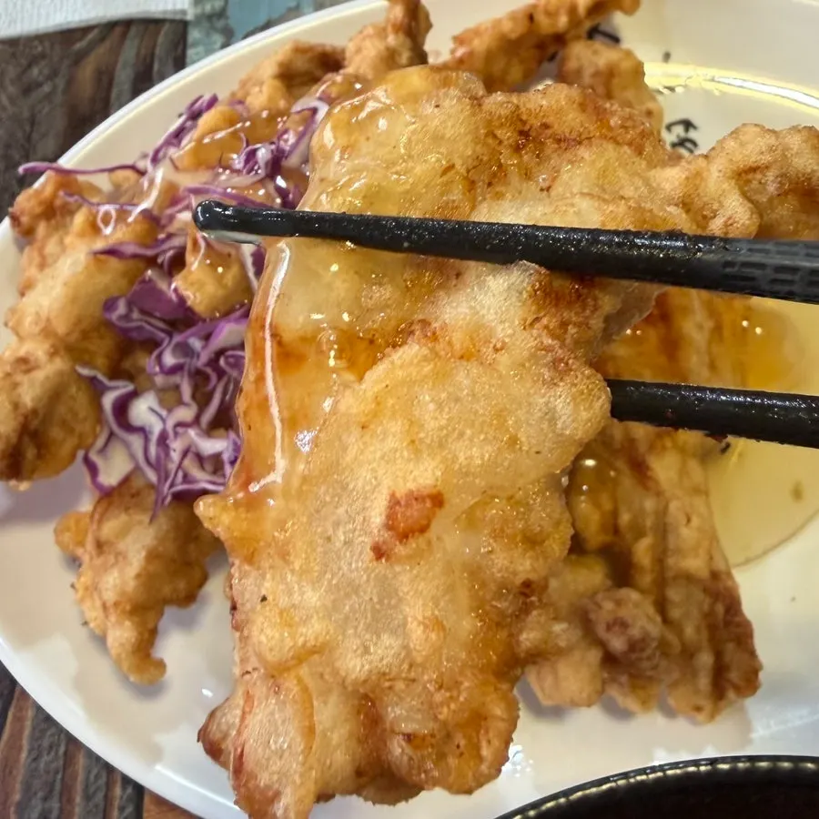 Glossy sweet-and-sour pork coated in sauce