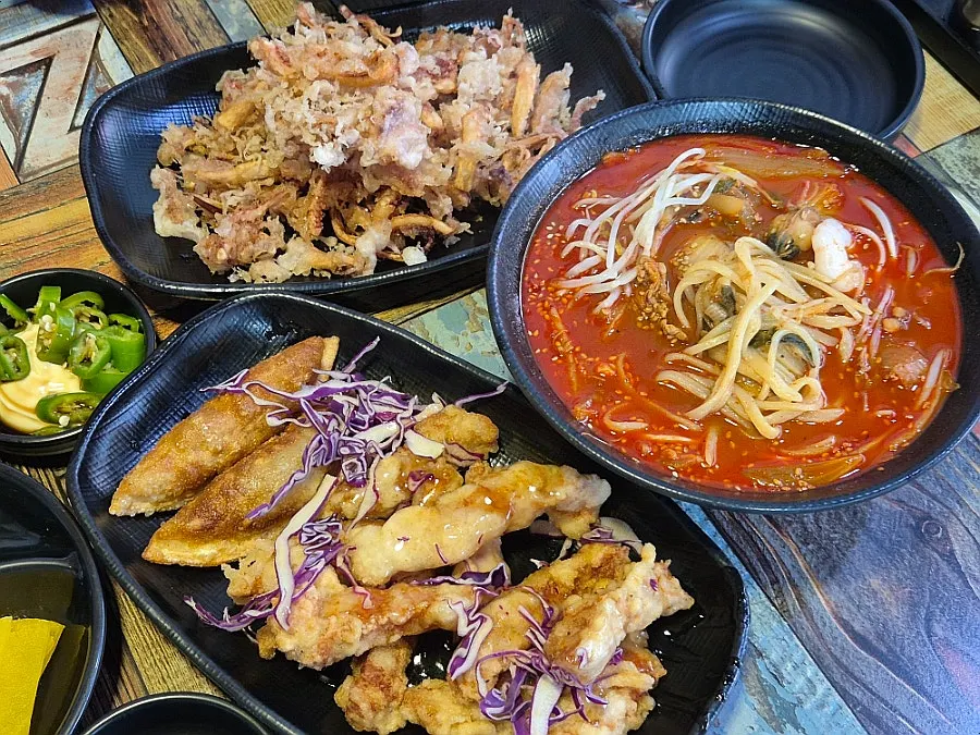 Sweet-and-sour pork and fried squid served quickly