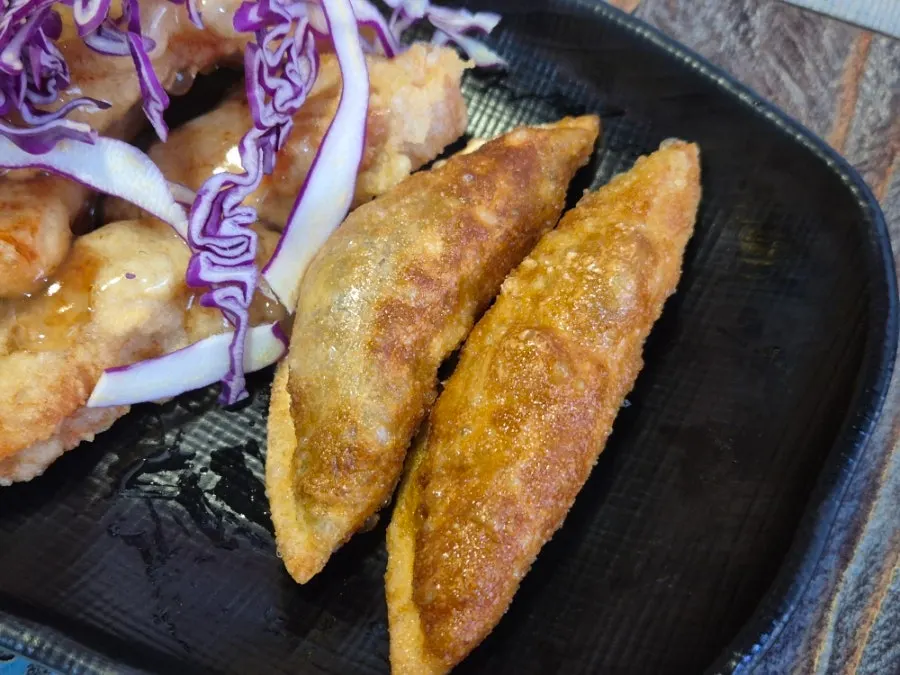 Fried dumplings served alongside