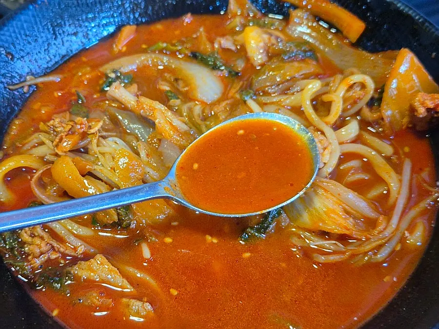 A spoonful of rich, clean jjamppong broth