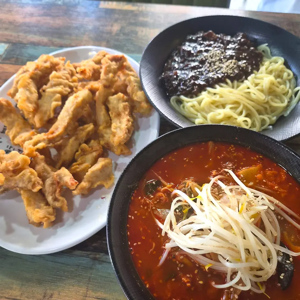 A full spread of jjamppong, jajangmyeon and tangsuyuk together
