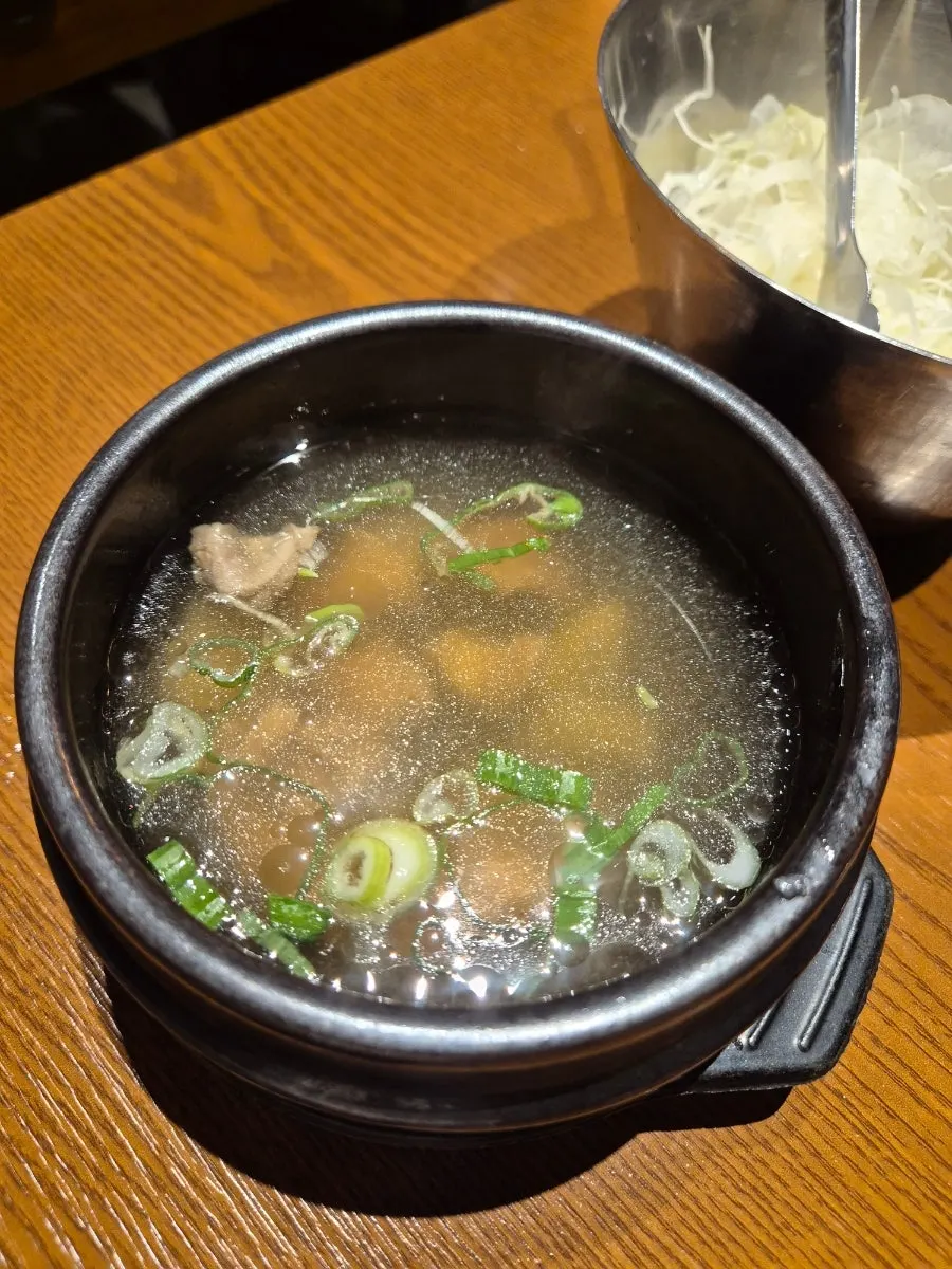 Table with individual charcoal grill at Yugi Dongnam District Main Branch