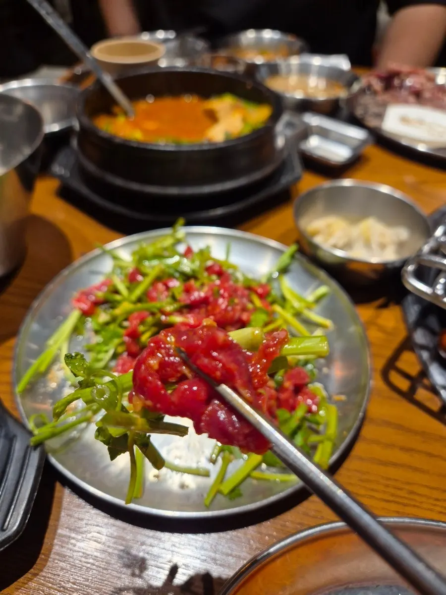 A full spread of meat, cheonggukjang, and rice