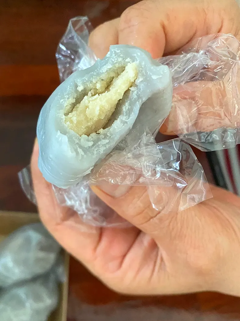 Chewy gamja-tteok in a container