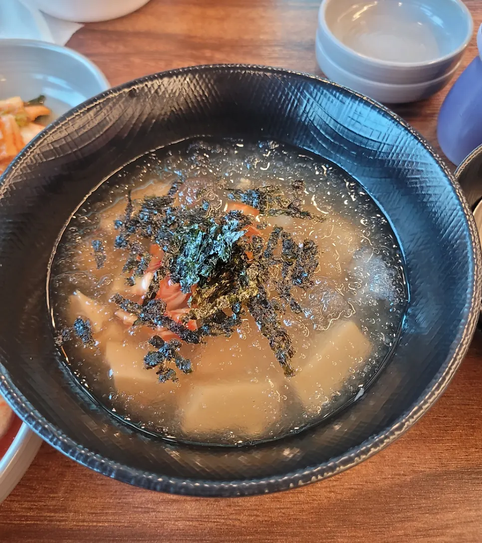 Nearly empty plate of spicy braised pork ribs