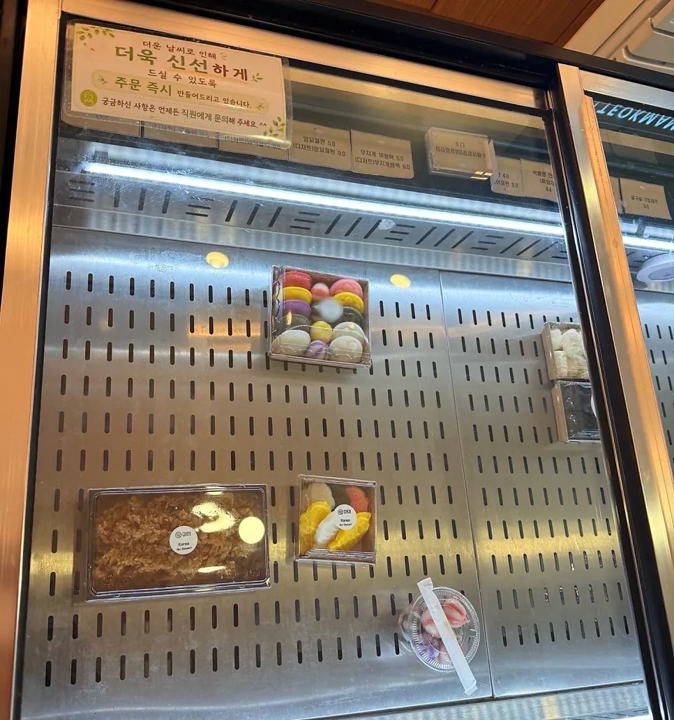 Sold-out signage visible on the shop counter
