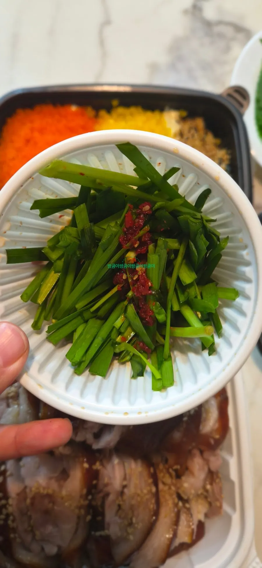 Takeout basic side dishes with lettuce and perilla wrap greens from Cheongmigwan