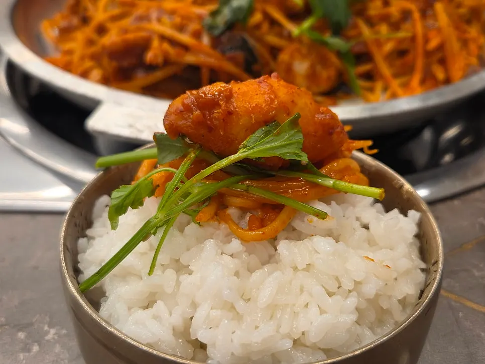 Generous tabletop-griddle dish with monkfish