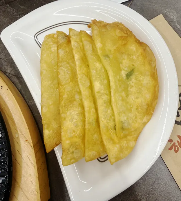 Bean sprouts placed on a flat dumpling