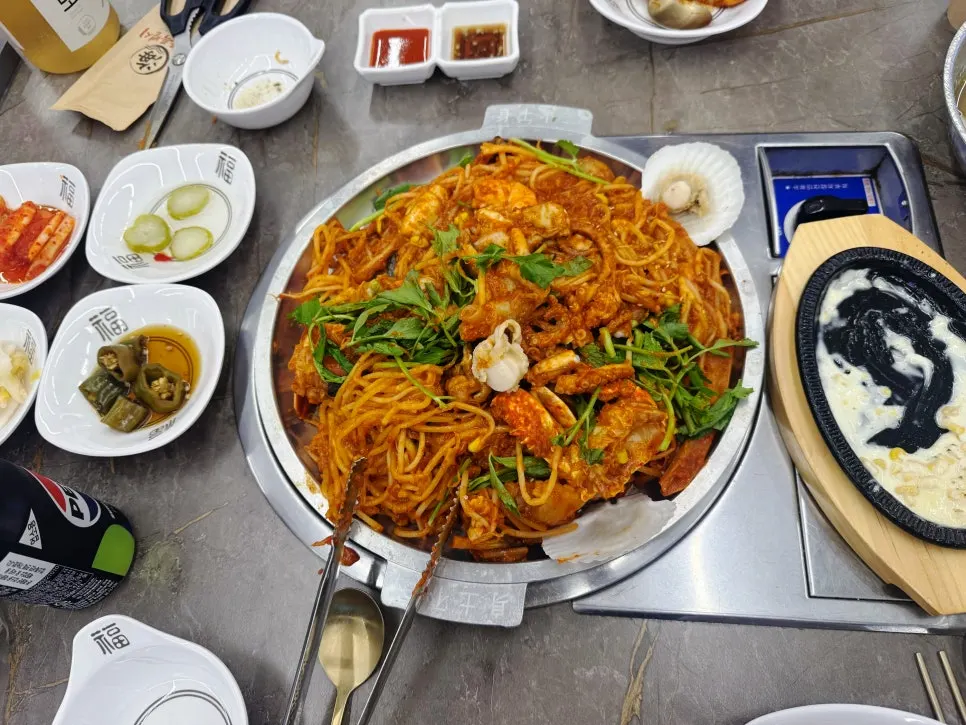 A plate combining monkfish, seafood and bean sprouts