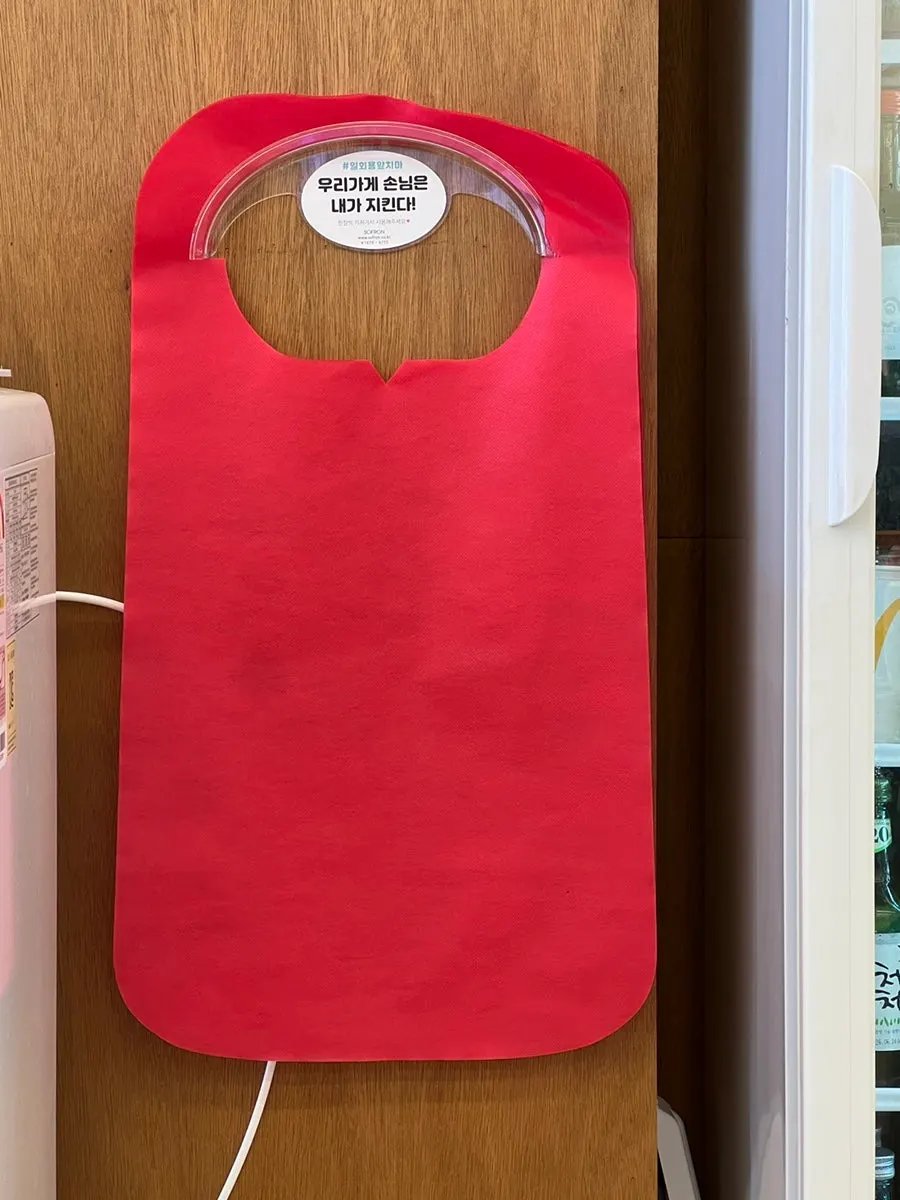 Restaurant with red aprons ready
