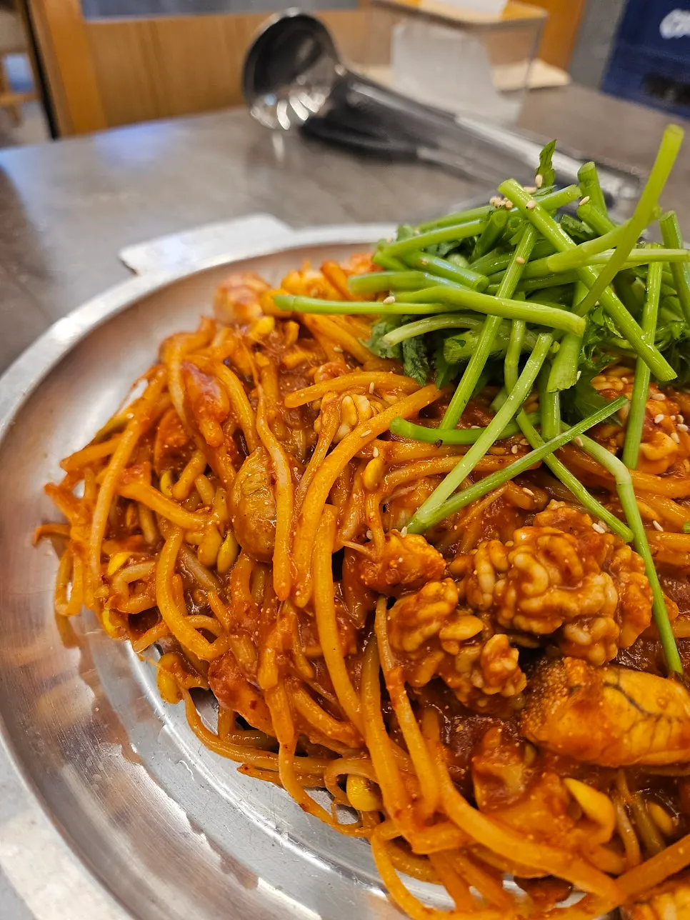 Goni coated in spicy sauce