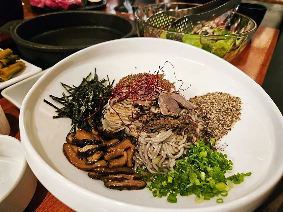 Meal dishes served with a Korean beef dinner
