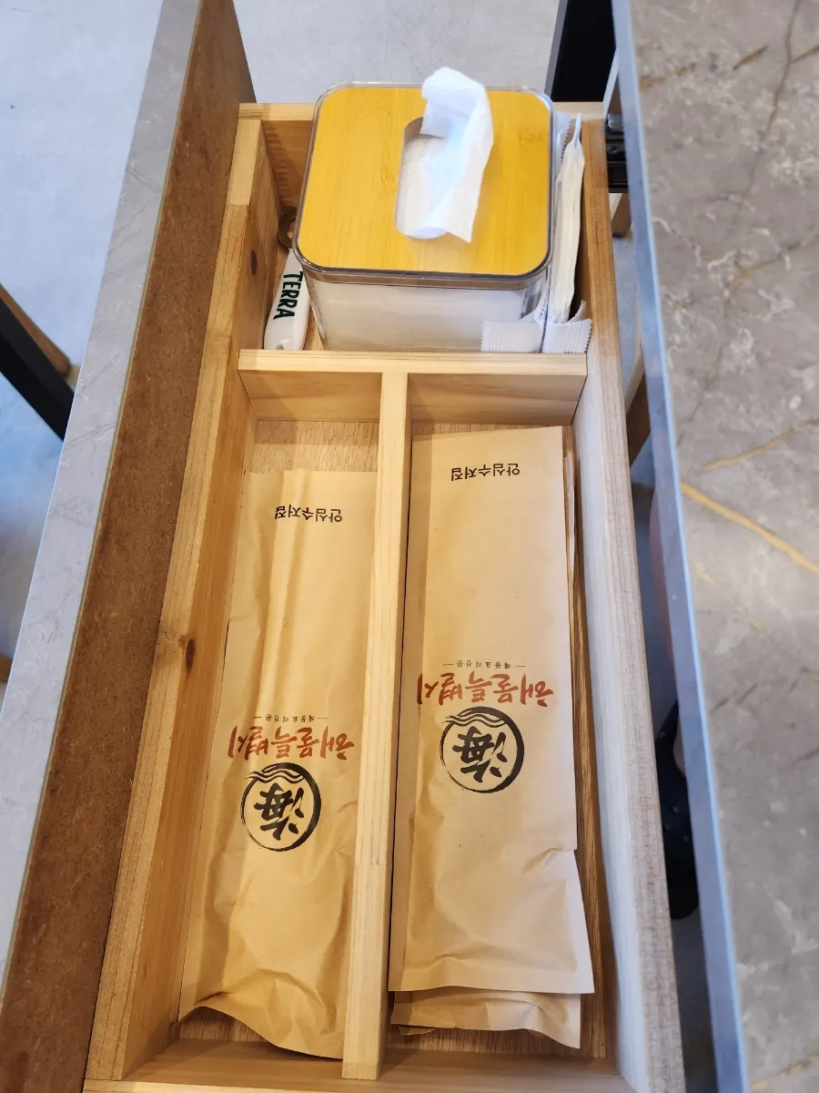 Cups and soy sauce prepared on the table