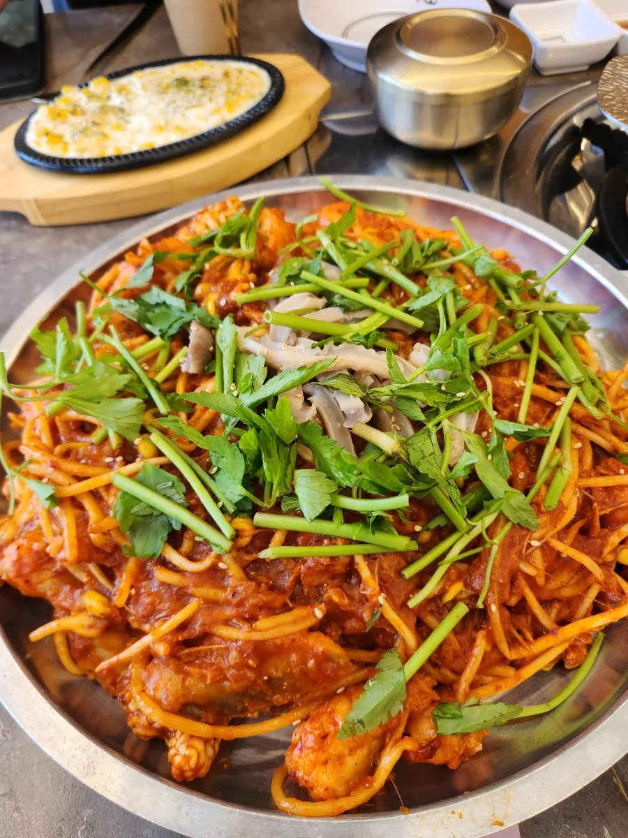 Boneless monkfish stew on an iron plate