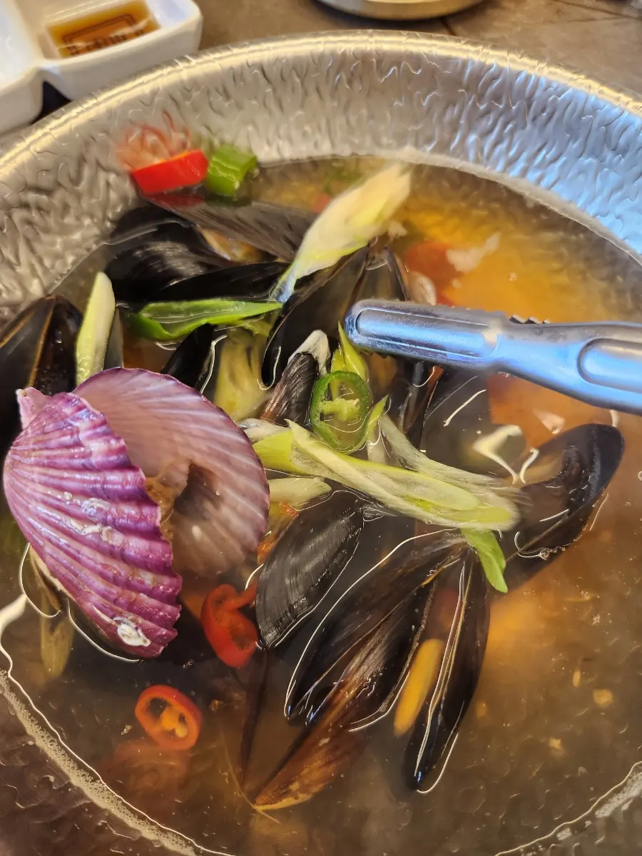 Clam soup with seafood broth
