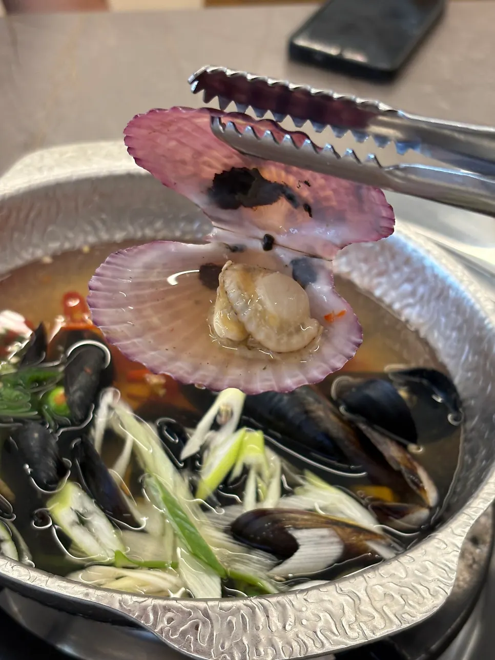 Tasting-size clam soup included in the monkfish stew set