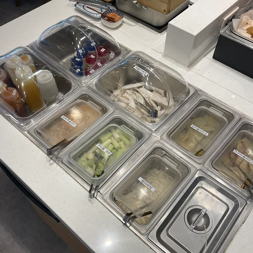 Self-service bar with a variety of foods
