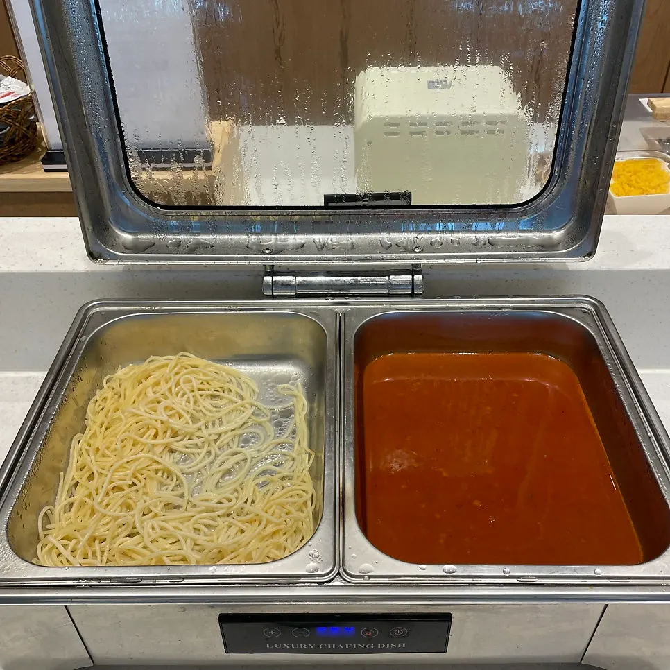 Self-service bar with various sauces and foods