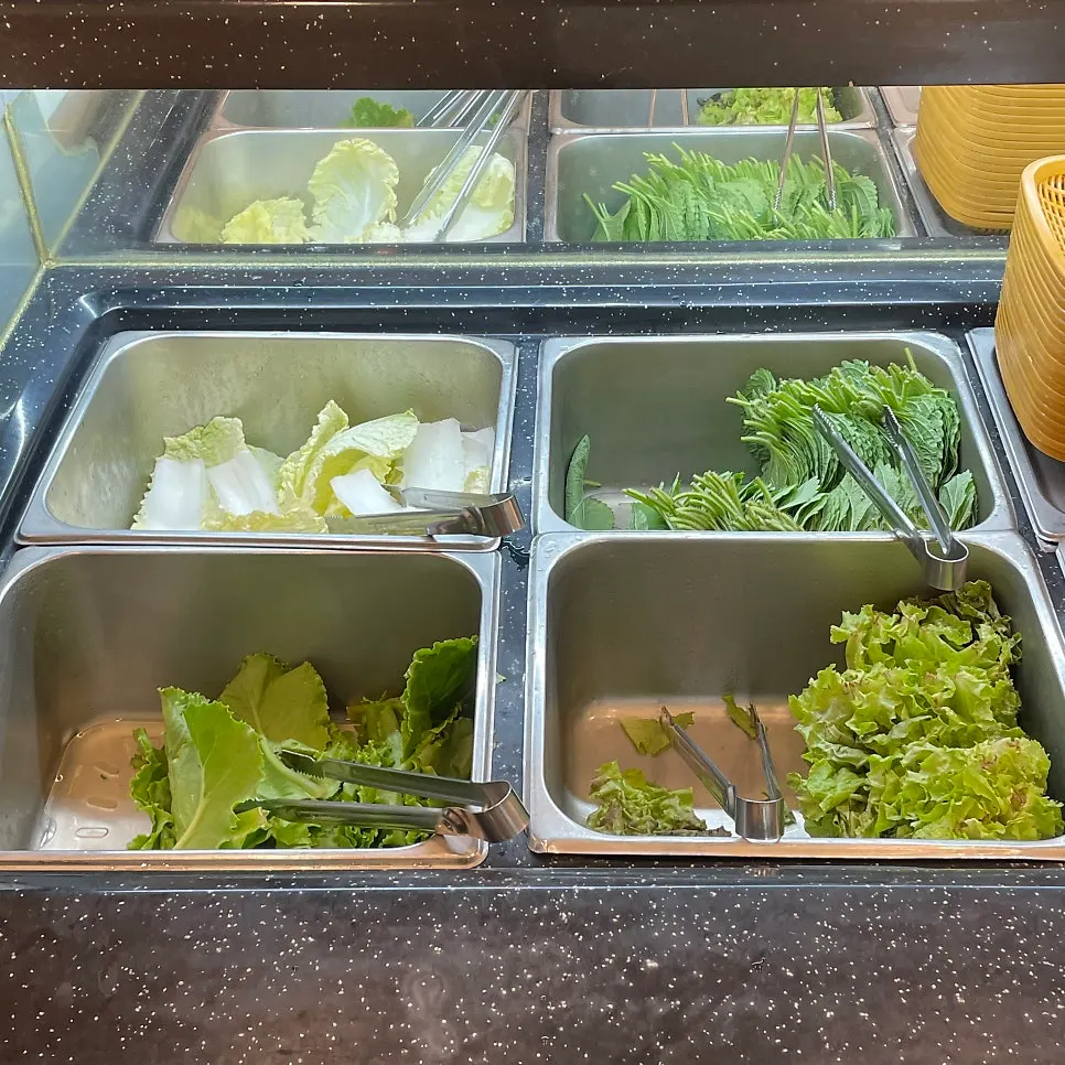 Self-service bar with many kinds of food