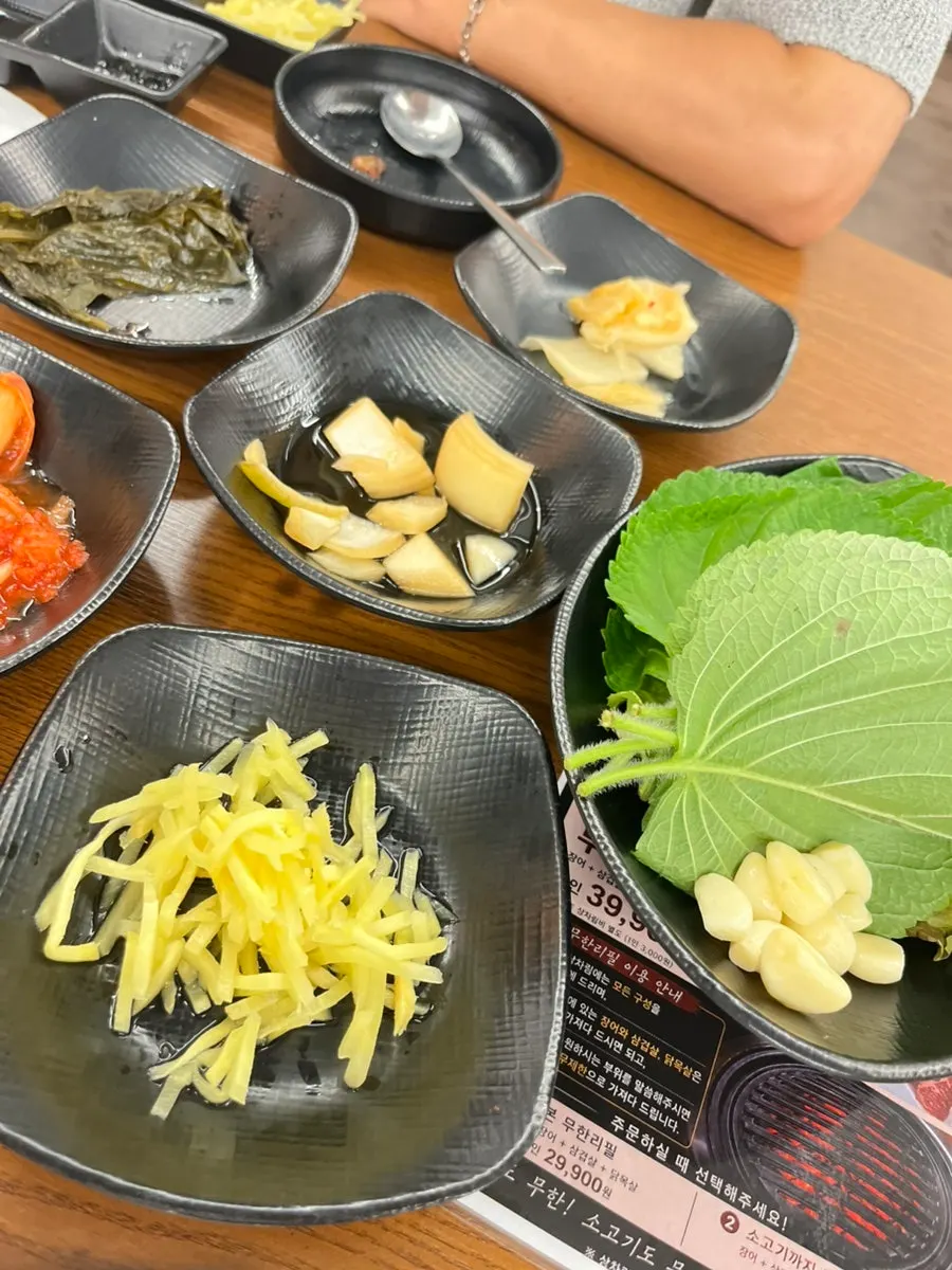 A plate of side dishes taken in a modest portion from the self-bar