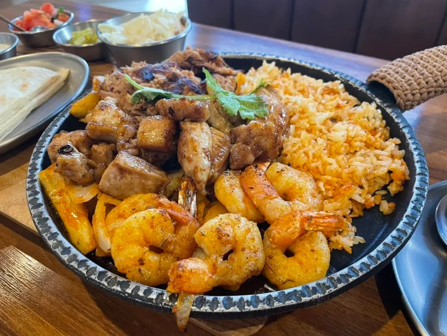 Fajita platter with meat, shrimp and fried rice