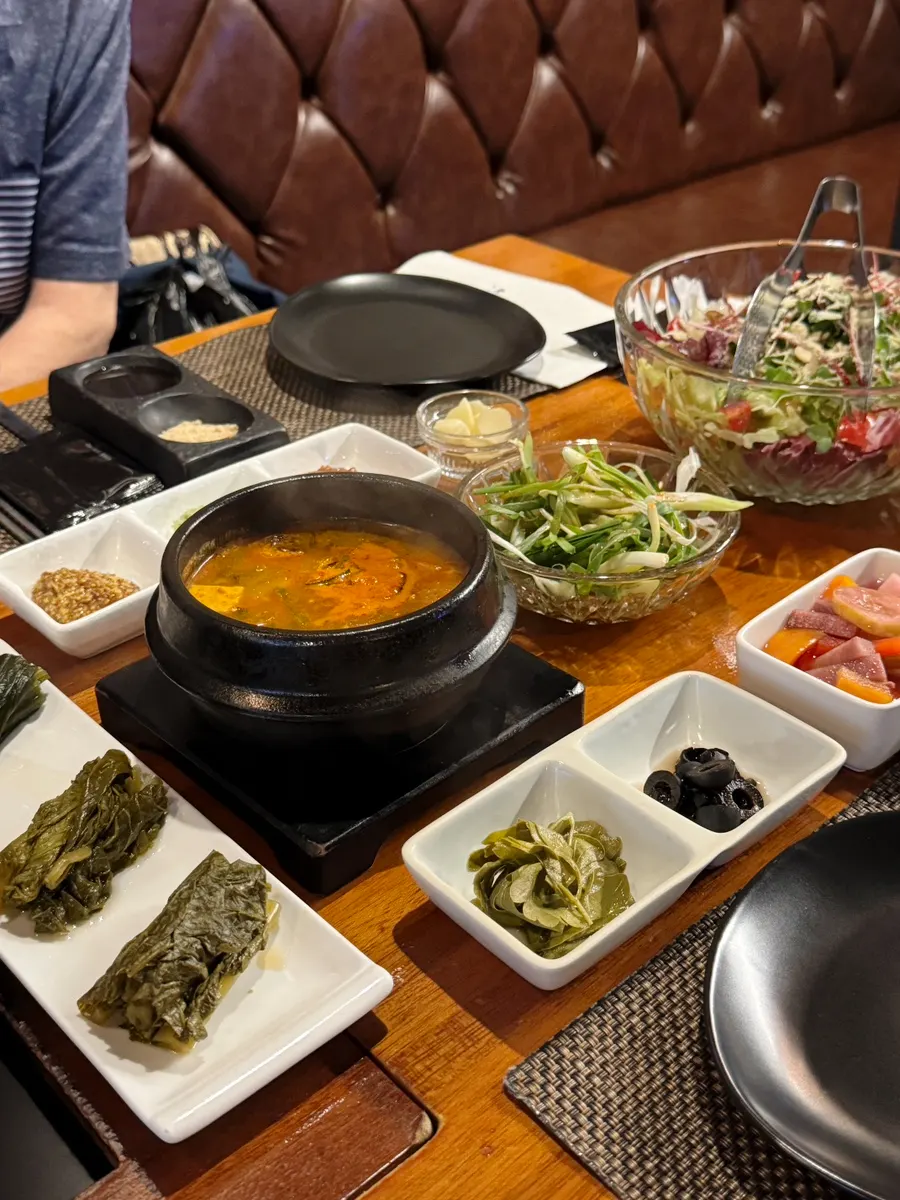 Fresh salad and side dishes at Suksung Myeongjak Cheongna