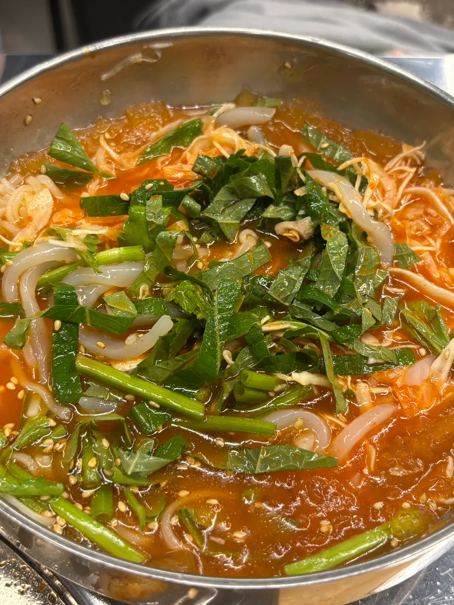 Refreshing squid mulhoe served into a bowl