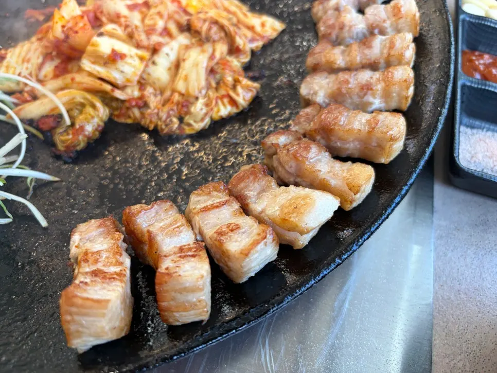 A platter of grilled whole pork belly