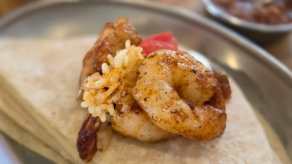 Two tortillas wrapped to each person's taste