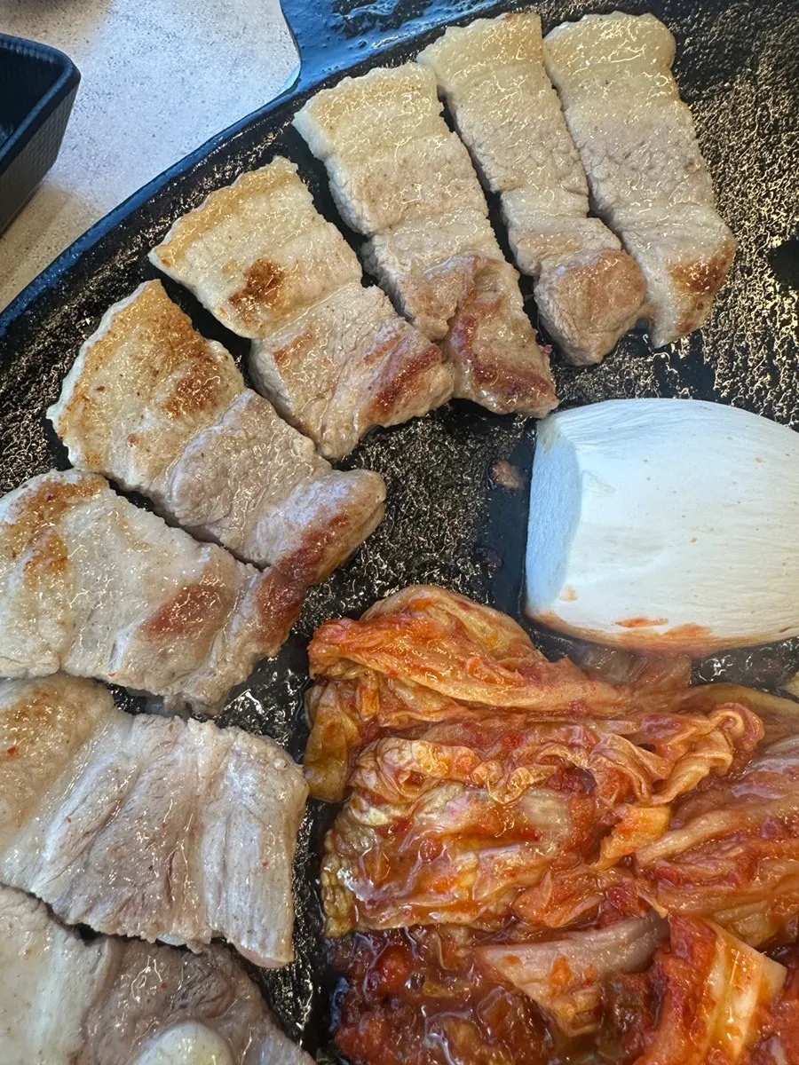 Meat with minari and kimchi