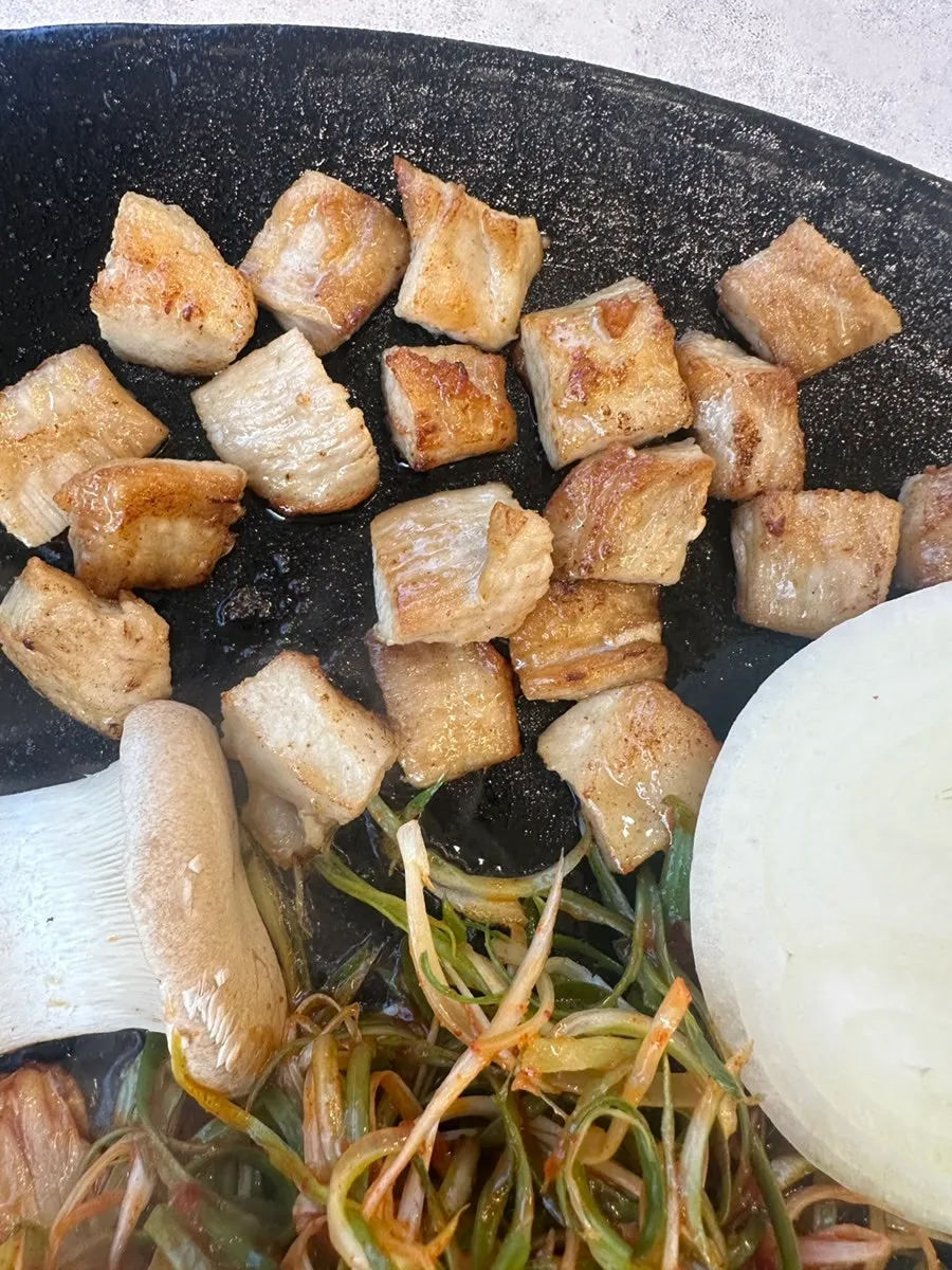 Platter of pork neck, pork belly, and pork jowl