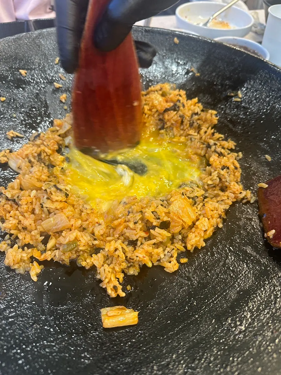 Sizzling kimchi fried rice with egg
