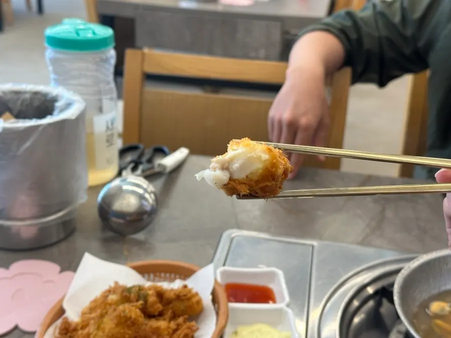 Cross-section of fried monkfish showing the meat inside