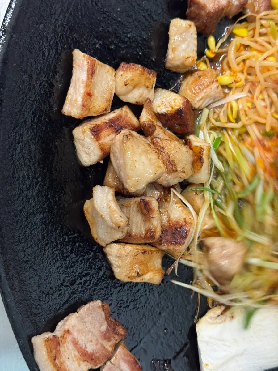 A savory piece of grilled pork jowl