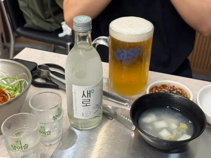 Cold draft beer enjoyed alongside the pork belly