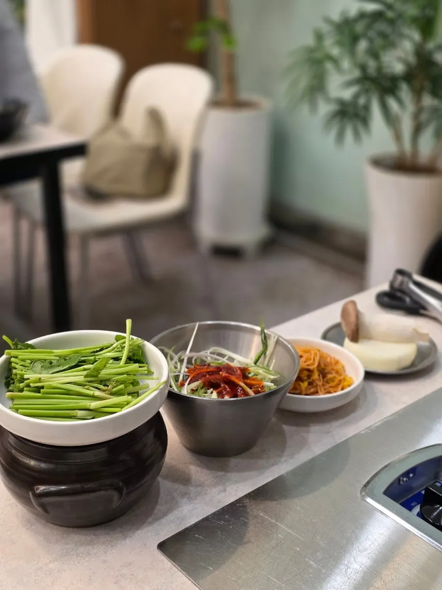 Full spread of side dishes at Sammi-jip