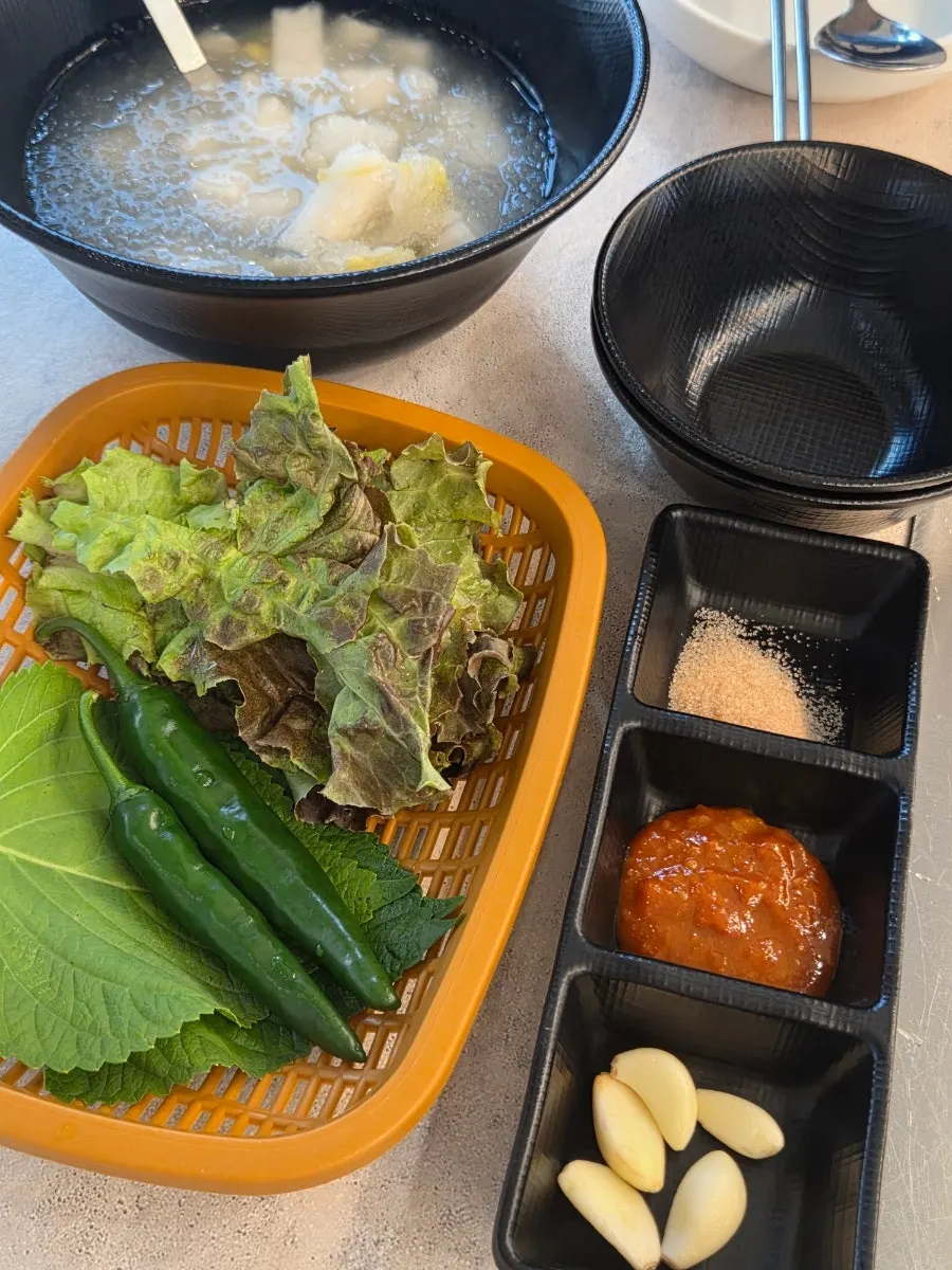 Table set with the ordered kimchi pork belly