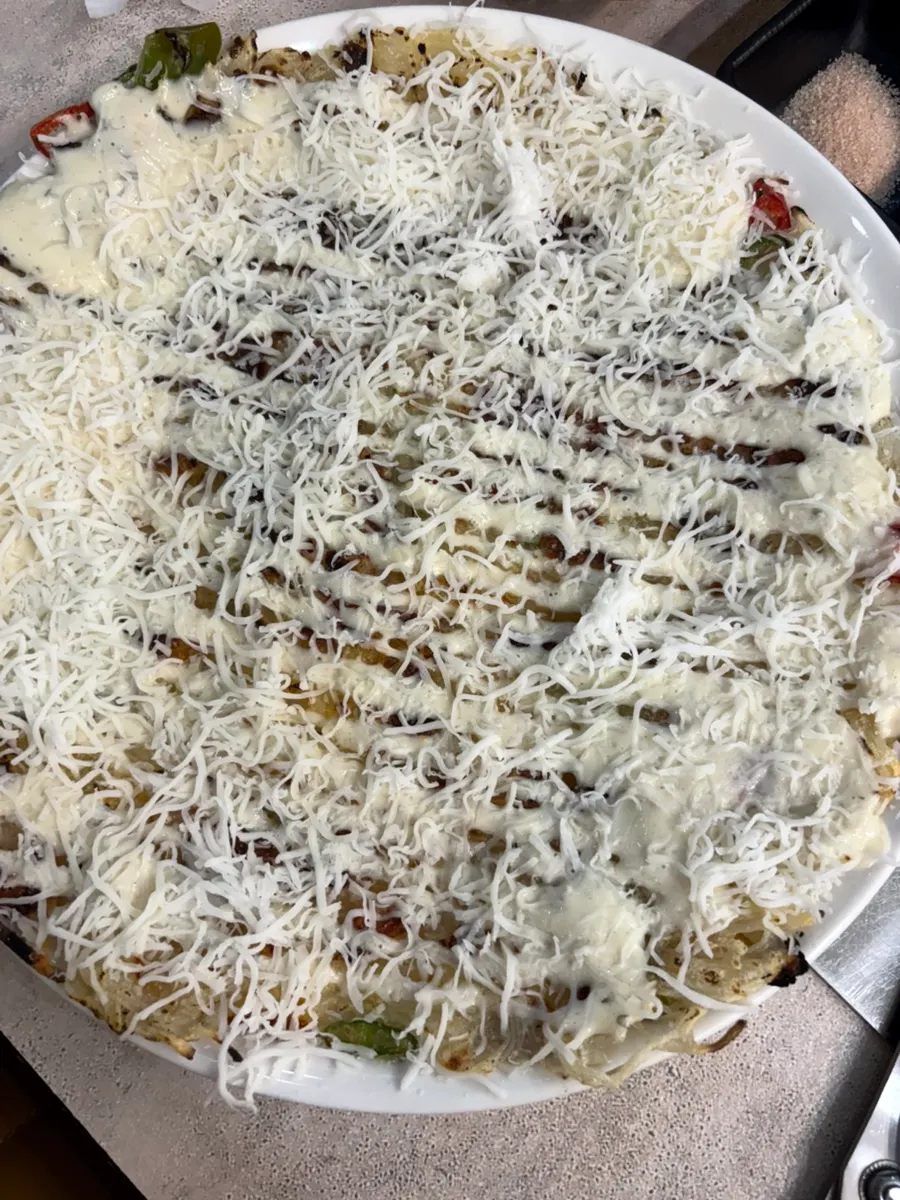 Potato cheese pancake served before the meat