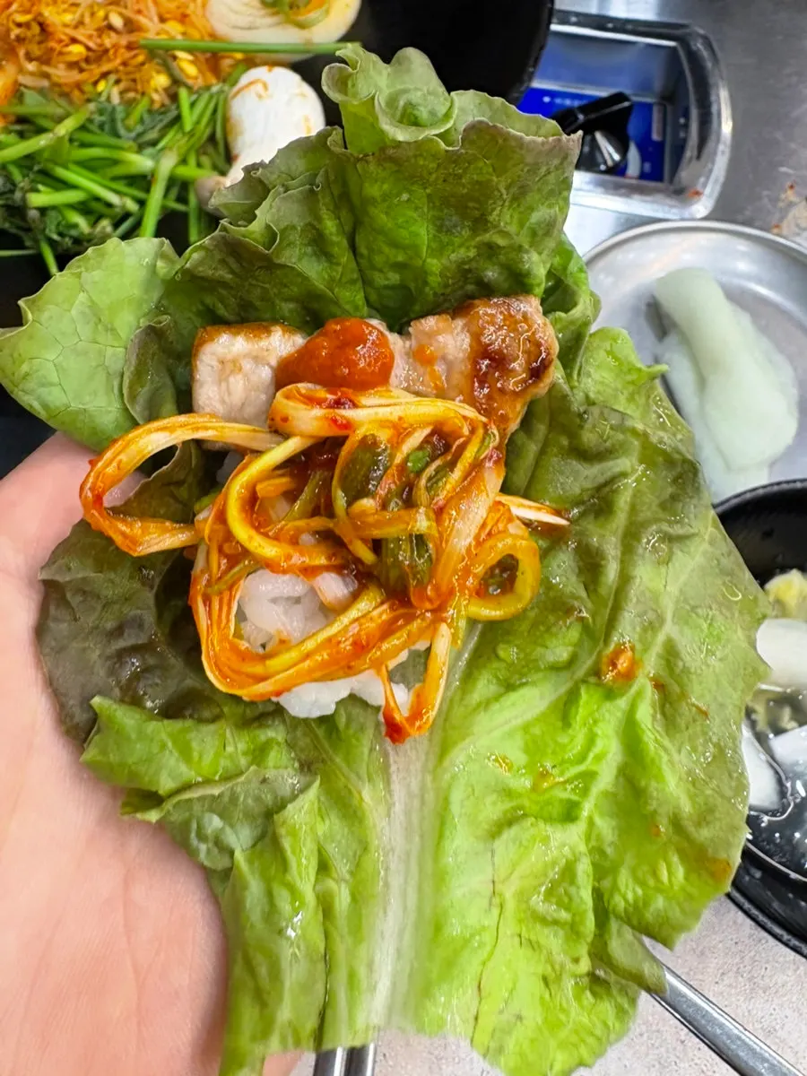 Pork belly wrapped in lettuce