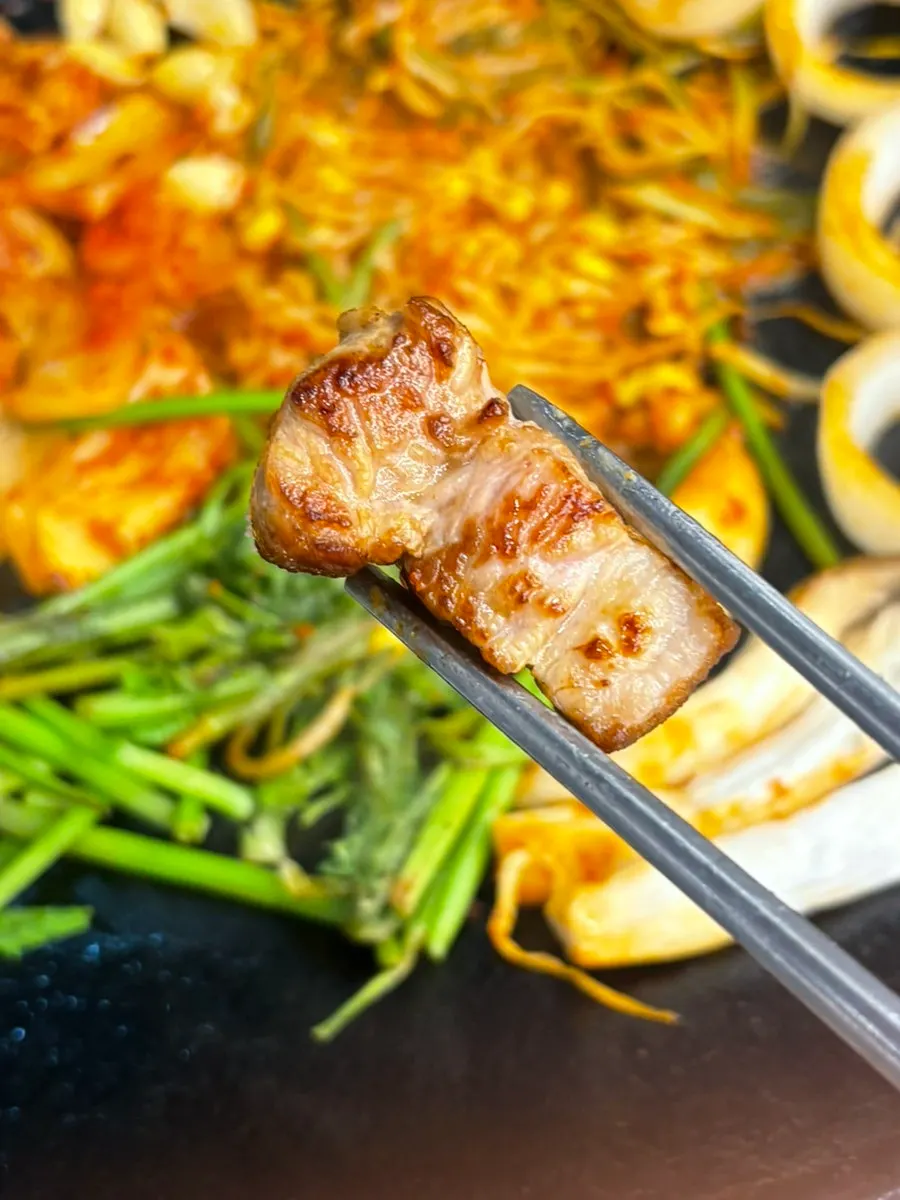 Grilled pork belly paired with grilled kimchi