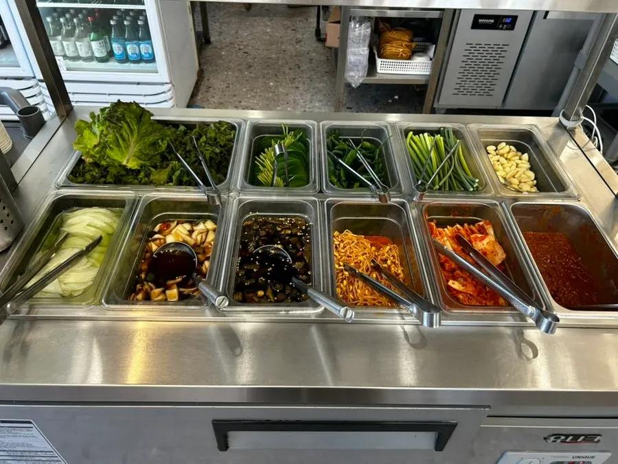 Sammi-jip self-serve bar with wrap vegetables and side dishes