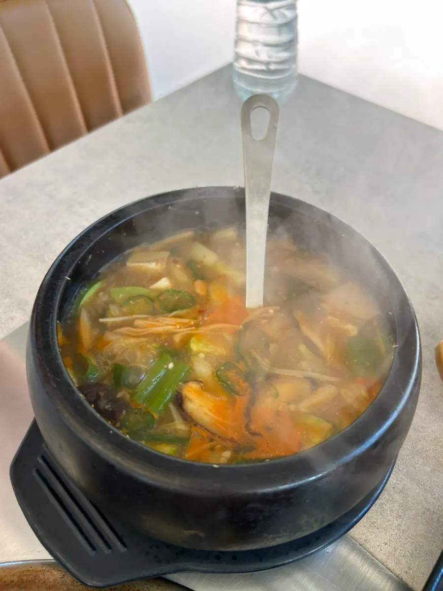 Grilled kimchi and mushrooms soaked in pork fat