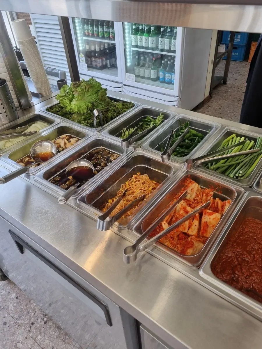 Various side dishes brought from the self-serve corner