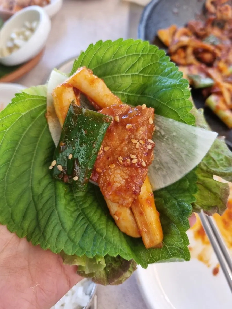 Close-up of plump squid and pork belly
