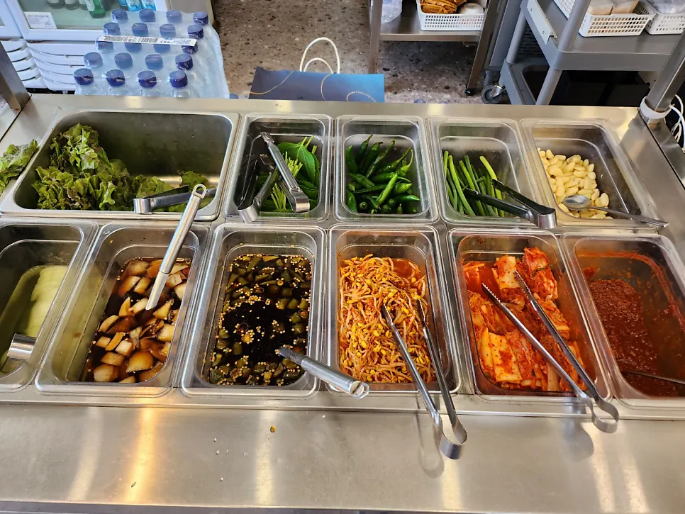 Side dishes organized by type at the self-serve bar