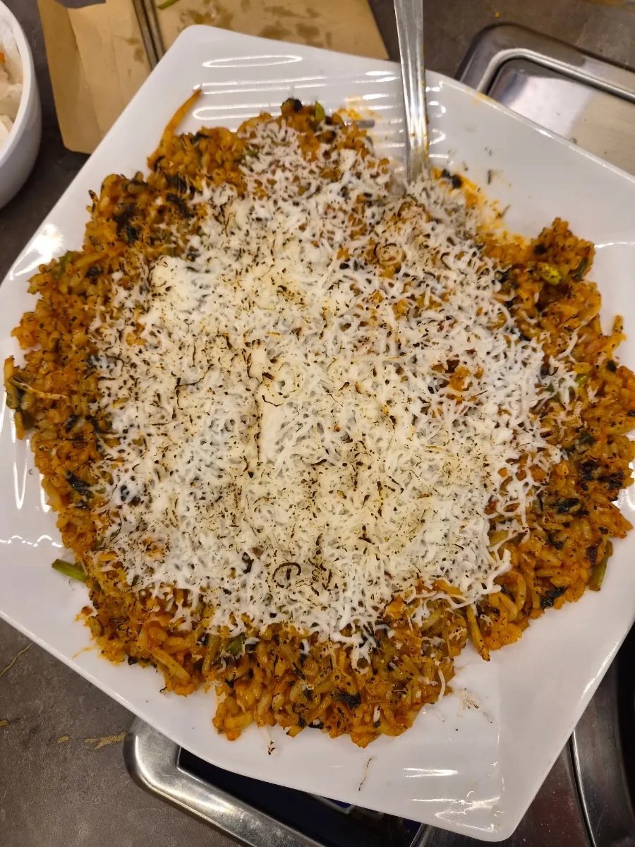 Cheese fried rice topped and stir-fried