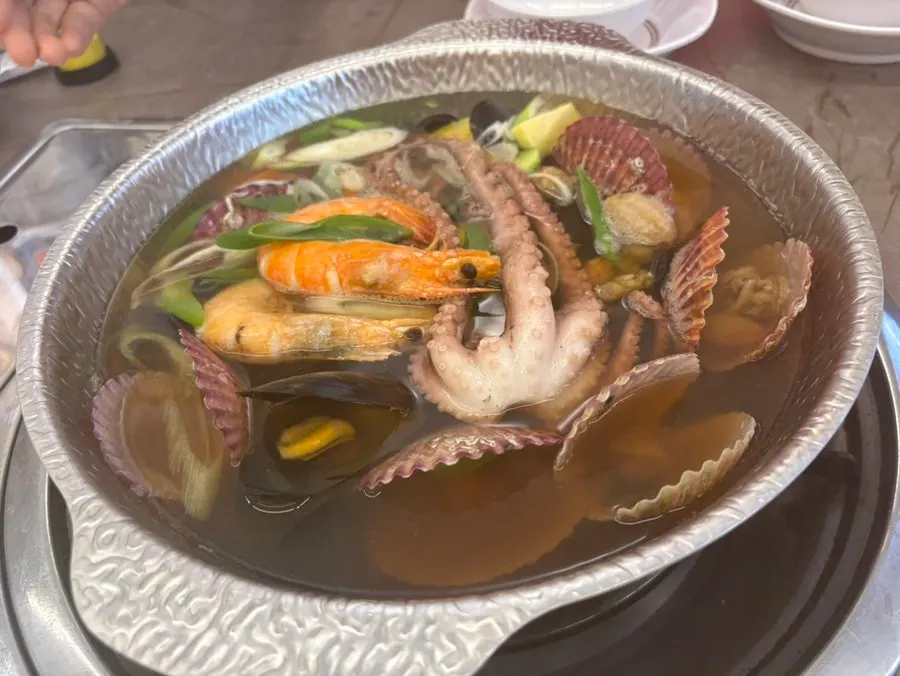 Seafood kalguksu before adding the noodles