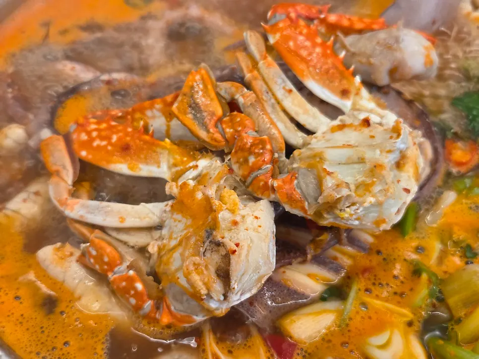 Reddened crab claws and body