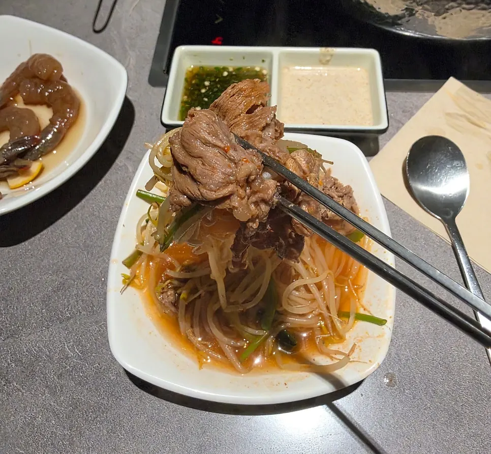 Shabu-shabu with a variety of accompanying foods